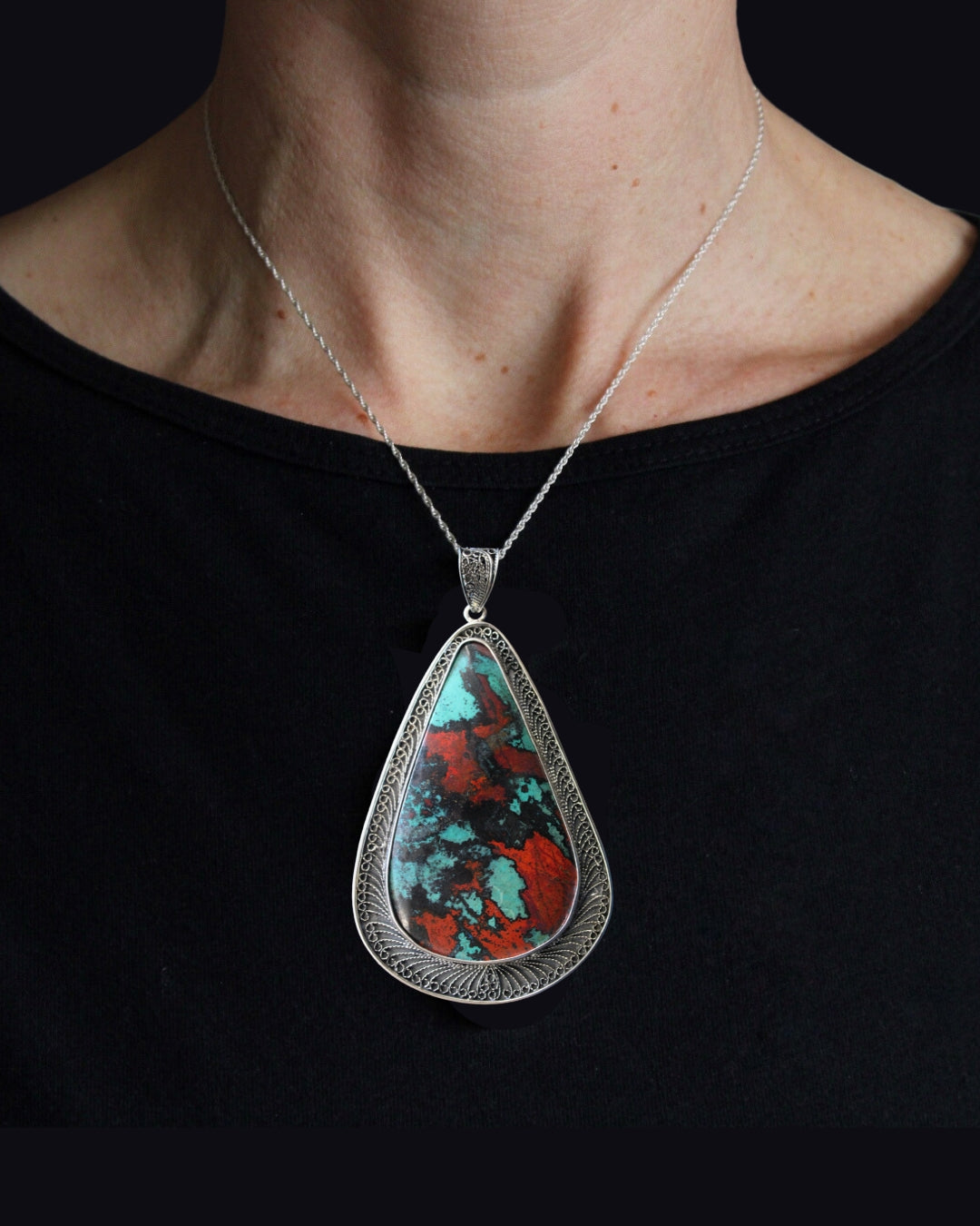 Stunning turqoise cabochon in sterling silver filigree setting