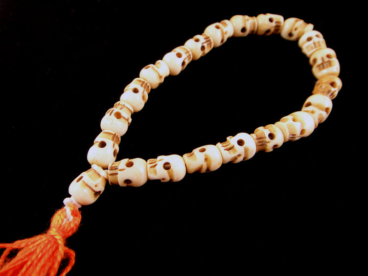 White Skull Bone Mala Bracelet- Orange Tassel